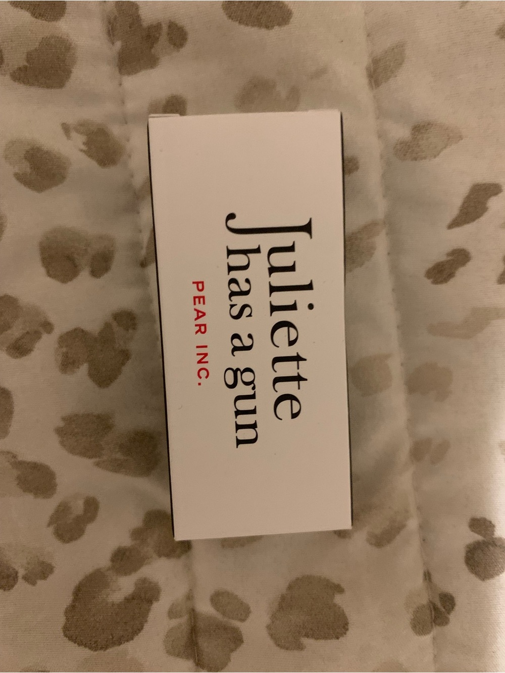 Juliette Has a Gun Pear Inc. Sample - White